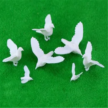 100pcs/lote de Plástico Aves Pequeña Figura de Juguete Modelo de Paloma Pájaro De la Paz Ho N OO Modelo de Tren OO Escala de Tren de Modelado