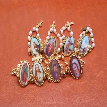 Católica de perlas broche de rosario broche de 12 piezas / random icono, la perla del rosario, jesús de la cruz, broche de joyería.