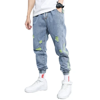 La moda Ripped Jeans para Hombres 2020 Nueva Temporada Cuatro Suelto Harén pantalones Vaqueros Ropa de Hip-Hop Estilo Agujero Pantalones de Cintura Elástica Pantalones