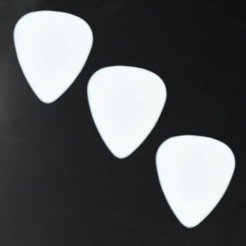 Lotes de 100 piezas Sólidas de color Blanco de 1 mm 1.5 mm de grueso Calibre Delrin Guitarra Bajo Recoge Plectrums