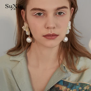 SuXin pendientes 2020 nuevas simple cáscara blanca flor aretes para las mujeres larga sección artificial colgante de perlas pendientes de la joyería de regalo